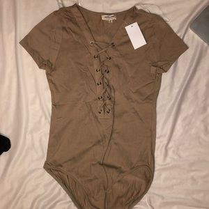 Women’s tan bodysuit